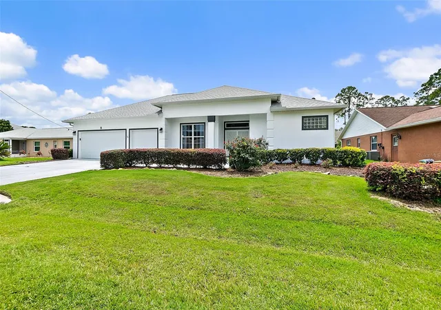 Photo 1 of Single family home for sale at 8 Eastgate Ln, Palm Coast, FL 32164 | MLS# FC319049 | Listing updated on 2026-08-27