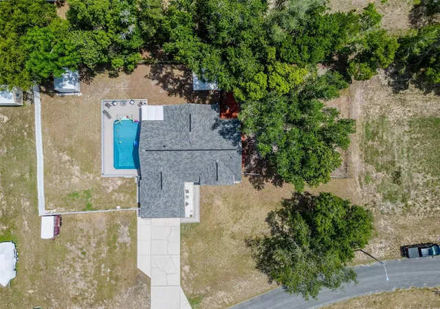 Photo 3 of Single family home for sale at 12090 Venice Dr, Spring Hill, FL 34609 | MLS# TB8515815 | Listing updated on 2026-08-26