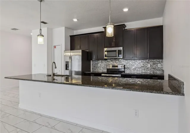 4th image of 1584 Slice Wy, Davenport, FL 33896 | MLS# O6413939