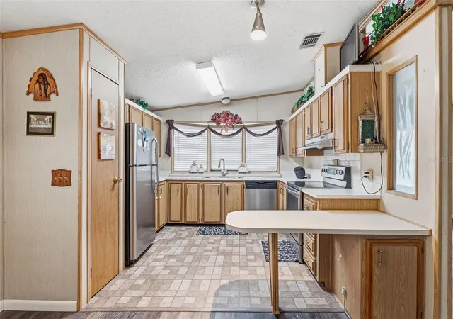 Photo 2 of Manufactured home for sale at 410 Dolphin Dr S, Oldsmar, FL 34677 | MLS# TB8515822 | Listing updated on 2026-08-10