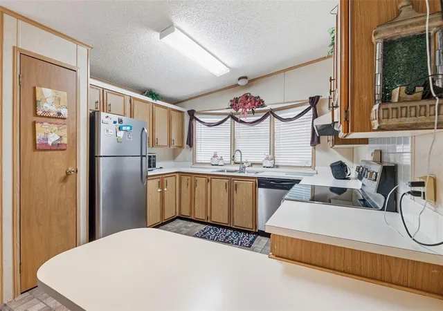 Photo 3 of Manufactured home for sale at 410 Dolphin Dr S, Oldsmar, FL 34677 | MLS# TB8515822 | Listing updated on 2026-08-10