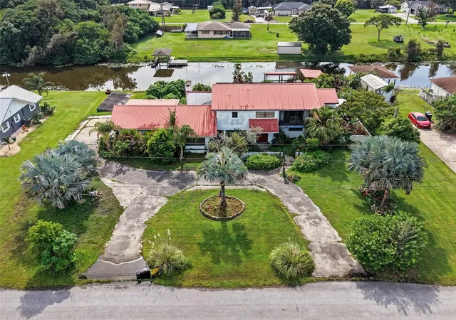 1st image of 6141 Palmetto Dr, Indian Lake Estates, FL 33855 | MLS# TB8515861