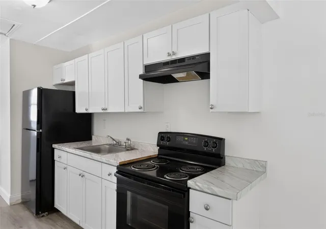 Photo 4 of Single family home for sale at 1635 Ravenall Ave, Orlando, FL 32811 | MLS# A4696045 | Listing updated on 2026-08-25