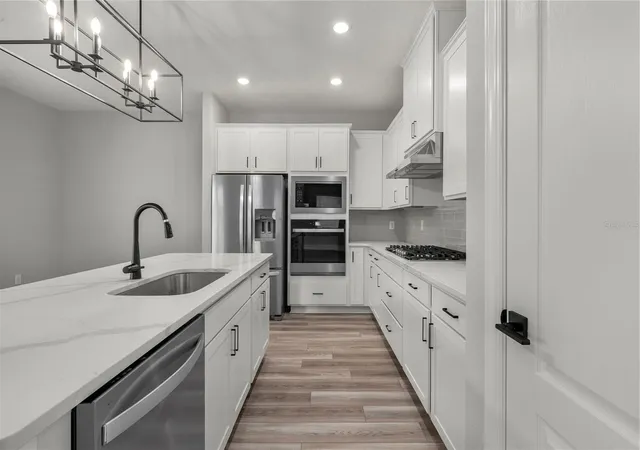 Photo 2 of Single family home for sale at 7899 Somersworth Dr, Kissimmee, FL 34747 | MLS# TB8515869 | Listing updated on 2026-07-16