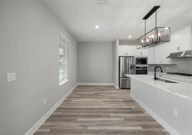 Photo 3 of Single family home for sale at 7899 Somersworth Dr, Kissimmee, FL 34747 | MLS# TB8515869 | Listing updated on 2026-07-16