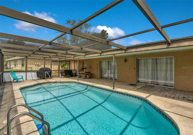 Photo 2 of Single family home for sale at 5262 Woodridge Ln, Spring Hill, FL 34609 | MLS# W7886428 | Listing updated on 2026-09-17