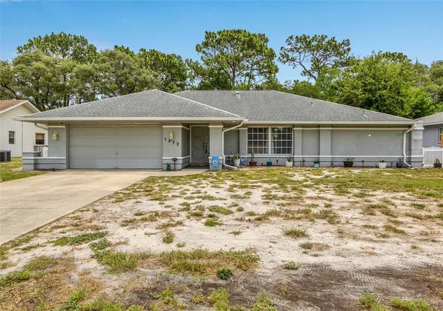 Photo 1 of Single family home for sale at 1372 Haulover Ave, Spring Hill, FL 34608 | MLS# W7886444 | Listing updated on 2026-09-28