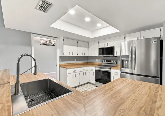 Photo 3 of Single family home for sale at 1372 Haulover Ave, Spring Hill, FL 34608 | MLS# W7886444 | Listing updated on 2026-09-28