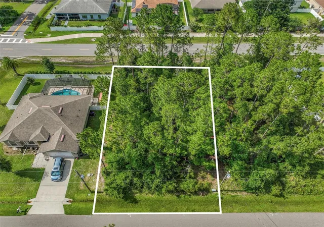 Photo 3 of Land for sale at 3 Kathryn Pl, Palm Coast, FL 32164 | MLS# FC319070 | Listing updated on 2026-07-25