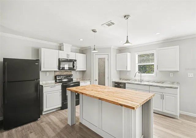 Photo 1 of Manufactured home for sale at 23950 Bass Rd, Astor, FL 32102 | MLS# V4949488 | Listing updated on 2026-09-24
