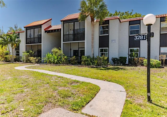Listing Photo 1 - Condo for sale in building located at 3281 Beneva Rd, Sarasota, FL 34232 - Unit #202