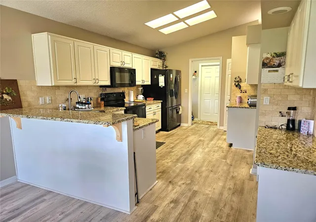 3rd image of 11340 Tee Time Cir, New Port Richey, FL 34654 | MLS# TB8516272