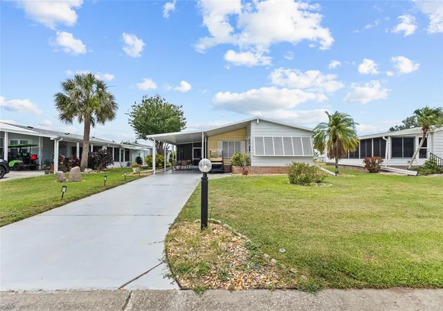 Photo 3 of Manufactured home for sale at 713 Tangerine Woods Blvd, Englewood, FL 34223 | MLS# N6144617 | Listing updated on 2026-09-27
