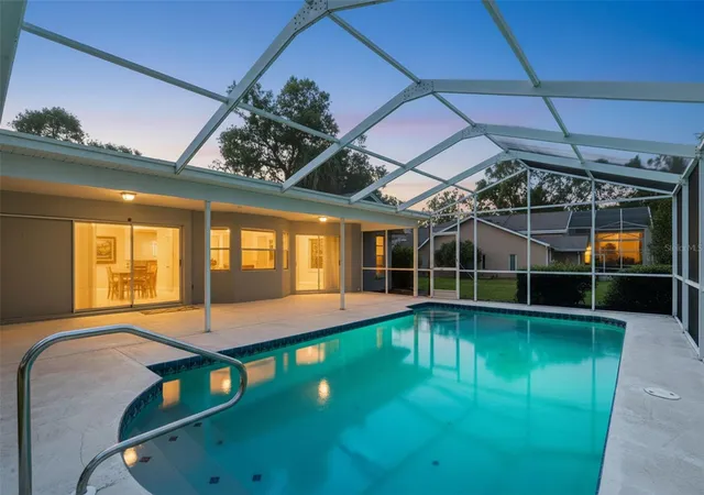 Photo 2 of Single family home for sale at 18451 Winding Oaks Blvd, Hudson, FL 34667 | MLS# W7886480 | Listing updated on 2026-10-03