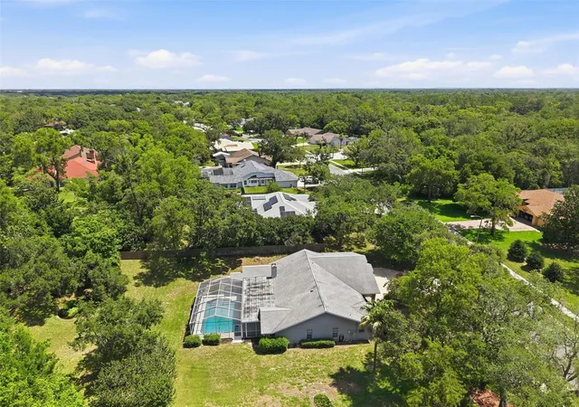 Photo 3 of Single family home for sale at 18451 Winding Oaks Blvd, Hudson, FL 34667 | MLS# W7886480 | Listing updated on 2026-10-03