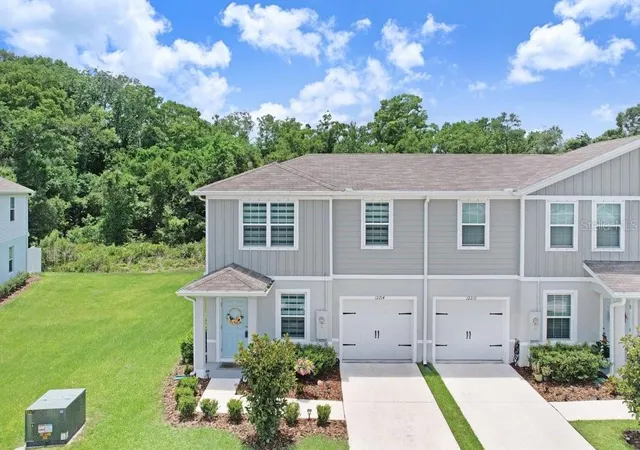 Photo 1 of Townhouse for sale at 12214 Grizzly Ln, New Port Richey, FL 34654 | MLS# TB8516479 | Listing updated on 2026-06-10