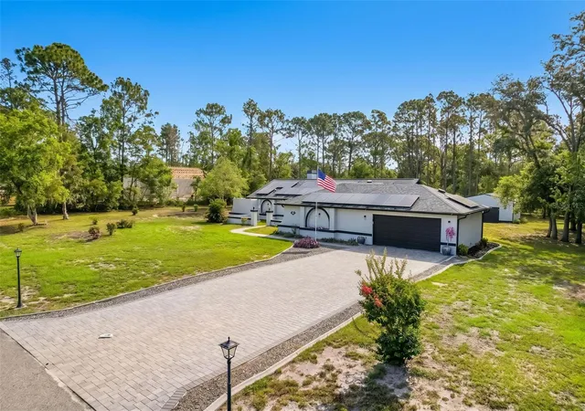 Photo 2 of Single family home for sale at 2044 Tunisia Ave, Spring Hill, FL 34609 | MLS# W7886492 | Listing updated on 2026-09-05