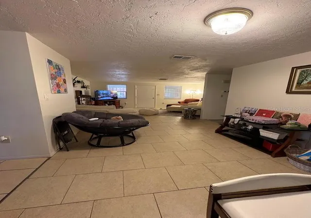 Photo 3 of Single family home for sale at 8220 Fox Holw Dr, Port Richey, FL 34668 | MLS# TB8516543 | Listing updated on 2026-06-30