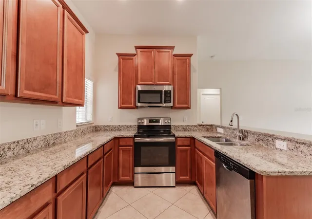 4th image of 18591 Briar Oaks Dr, Hudson, FL 34667 | MLS# O6414610