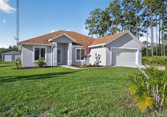 1st image of 4101 Poinciana Dr, Indian Lake Estates, FL 33855 | MLS# TB8516649