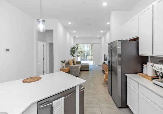 Photo 3 of Townhouse for sale at 10340 Ebb Tide Ln, Orlando, FL 32821 | MLS# O6414665 | Listing updated on 2026-08-16