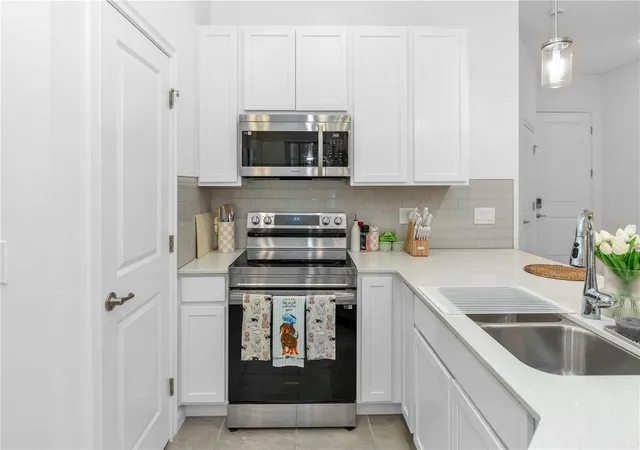 Photo 4 of Townhouse for sale at 10340 Ebb Tide Ln, Orlando, FL 32821 | MLS# O6414665 | Listing updated on 2026-08-16