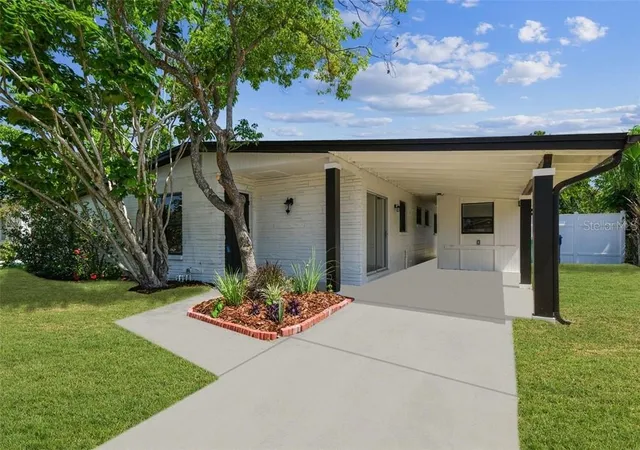 Photo 2 of Single family home for sale at 6551 S W Shore Cir, Tampa, FL 33616 | MLS# TB8516713 | Listing updated on 2026-07-25