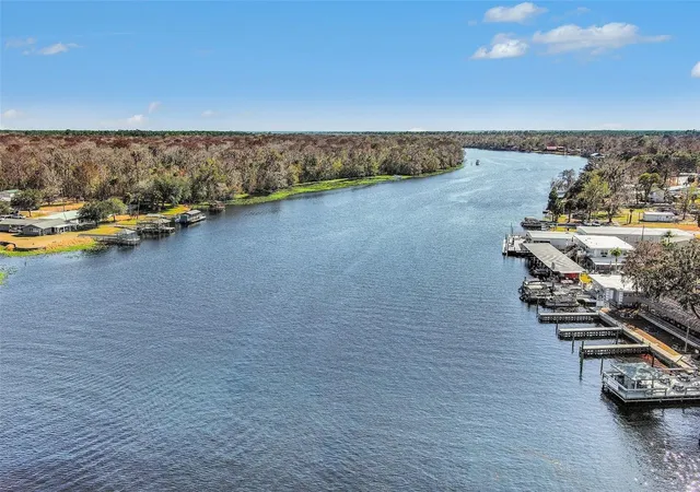 Photo 2 of Manufactured home for sale at 24421 Trespass Trl, Astor, FL 32102 | MLS# V4949524 | Listing updated on 2026-09-01
