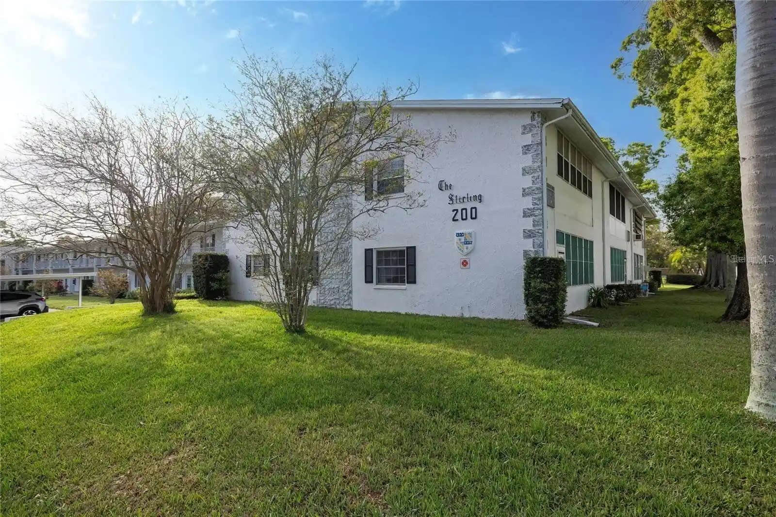 Listing Photo 1 - Condo for sale in 200 Glennes Ln located at 200 Glennes Ln, DUNEDIN, FL 34698 - Unit #114