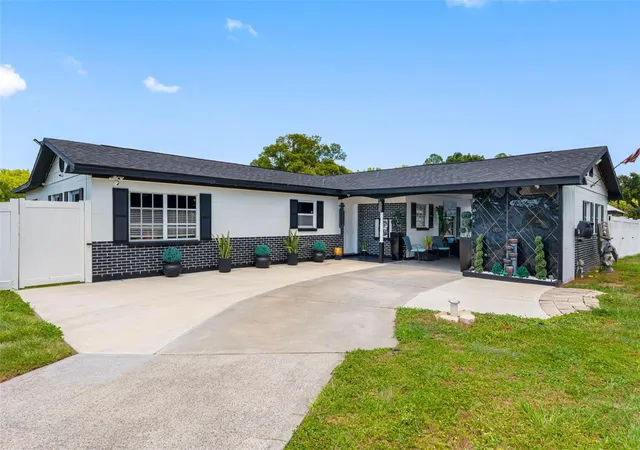 1st image of 5515 Lake Le Clare Rd, Lutz, FL 33558 | MLS# TB8516728