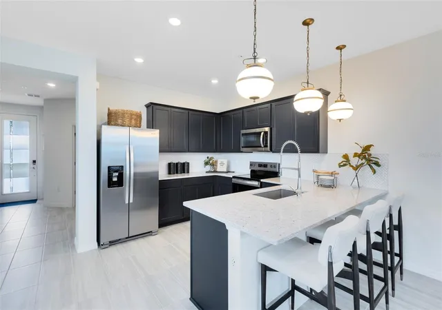Photo 4 of Townhouse for sale at 1139 Lemongrass Aly, Orlando, FL 32820 | MLS# O6414727 | Listing updated on 2026-09-15