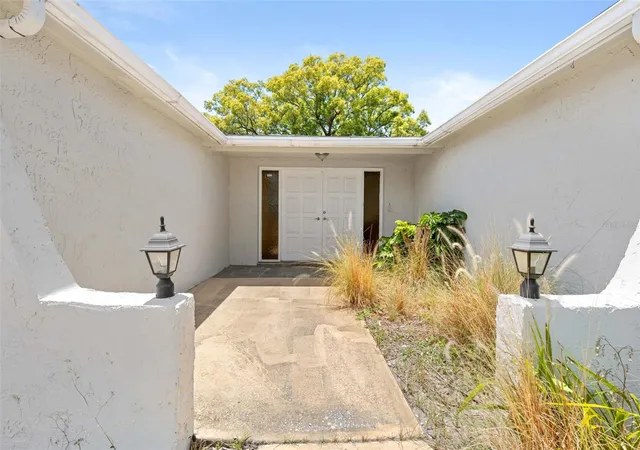Photo 4 of Single family home for sale at 9131 Hunt Clb Ln, Port Richey, FL 34668 | MLS# TB8516793 | Listing updated on 2026-08-24