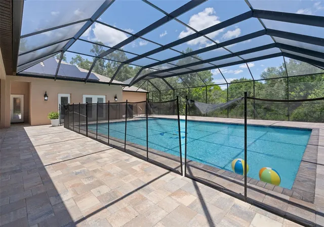 Photo 3 of Single family home for sale at 222 Suncoast Blvd, Spring Hill, FL 34608 | MLS# TB8516840 | Listing updated on 2026-07-11
