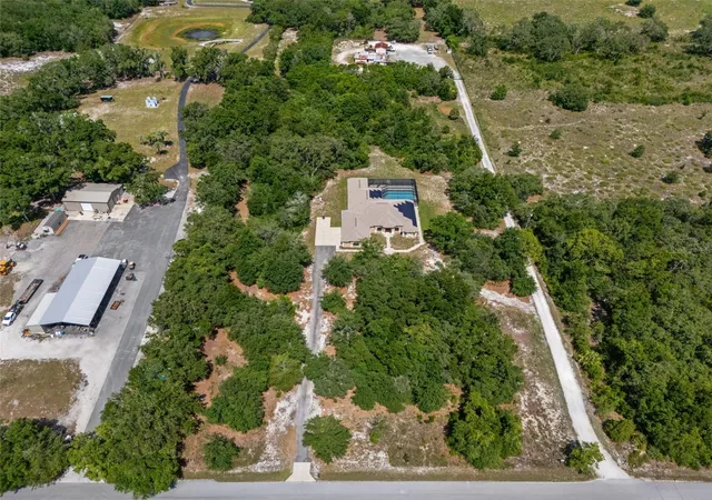 Photo 5 of Single family home for sale at 222 Suncoast Blvd, Spring Hill, FL 34608 | MLS# TB8516840 | Listing updated on 2026-07-11