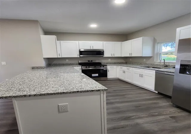Photo 2 of Single family home for sale at 5024 Finders Ct, Tampa, FL 33617 | MLS# TB8516846 | Listing updated on 2026-06-09