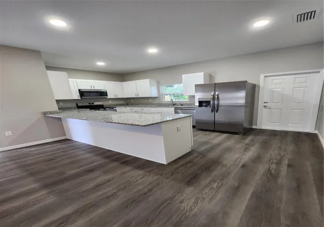Photo 3 of Single family home for sale at 5024 Finders Ct, Tampa, FL 33617 | MLS# TB8516846 | Listing updated on 2026-06-09