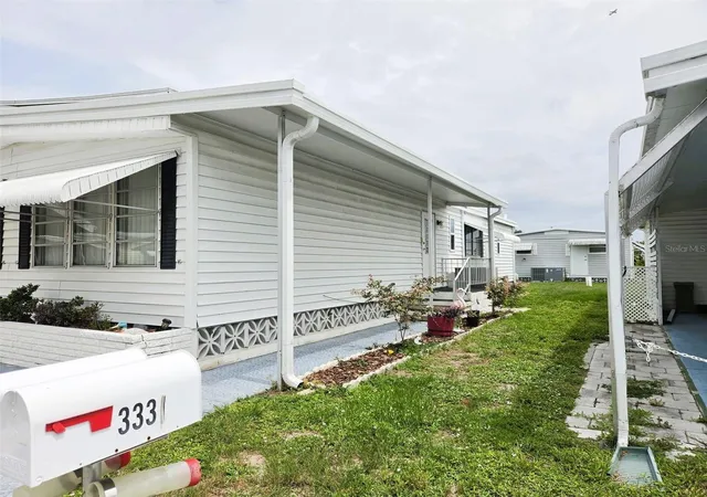 Photo 3 of Manufactured home for sale at 3329 Oakwood Blvd S, Sarasota, FL 34237 | MLS# A4696381 | Listing updated on 2026-09-30