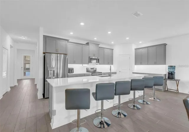 Photo 3 of Single family home for sale at 11941 Language Way, Orlando, FL 32832 | MLS# O6414908 | Listing updated on 2026-09-15