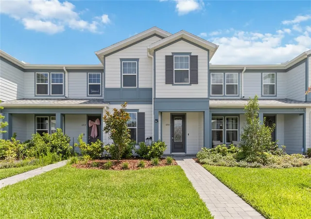 Photo 1 of Townhouse for sale at 6910 Reverie Park Ave St, Orlando, FL 32829 | MLS# O6415040 | Listing updated on 2026-07-12
