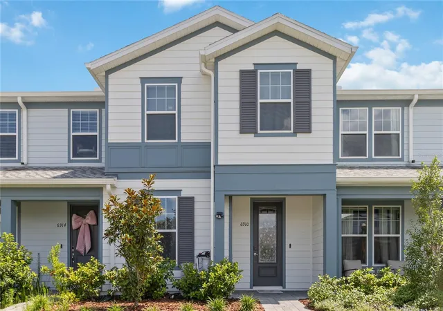 Photo 2 of Townhouse for sale at 6910 Reverie Park Ave St, Orlando, FL 32829 | MLS# O6415040 | Listing updated on 2026-07-12