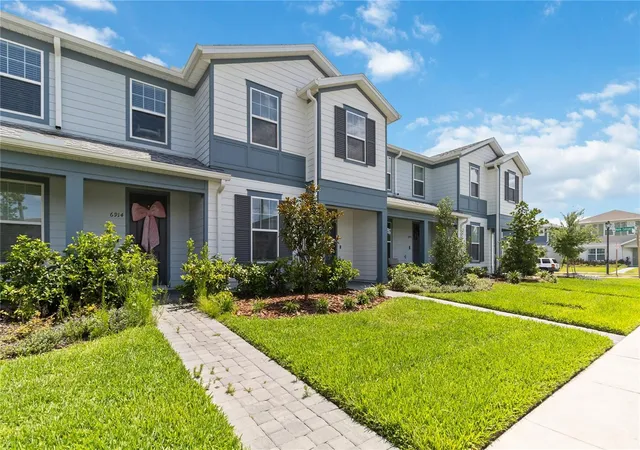 Photo 3 of Townhouse for sale at 6910 Reverie Park Ave St, Orlando, FL 32829 | MLS# O6415040 | Listing updated on 2026-07-12