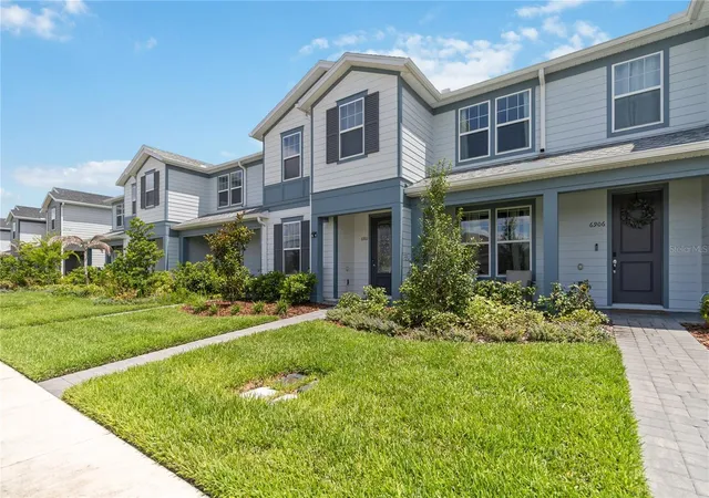 Photo 3 of Townhouse for sale at 6910 Reverie Park Ave St, Orlando, FL 32829 | MLS# O6415040 | Listing updated on 2026-07-12