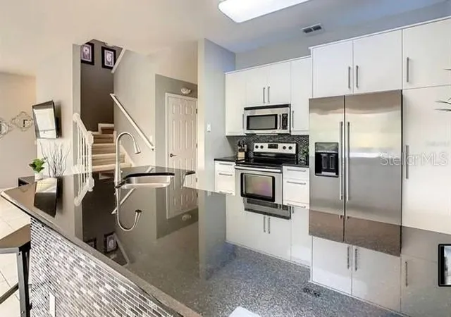 Photo 3 of Townhouse for sale at 3163 Yellow Lantana Ln, Kissimmee, FL 34747 | MLS# O6415064 | Listing updated on 2026-10-07