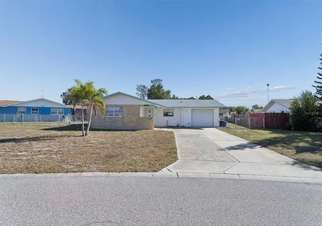 Photo 3 of Sale Pending at 7608 Redcoat Ave, Port Richey, FL 34668 | MLS# O6415117 | Listing updated on 2026-08-19