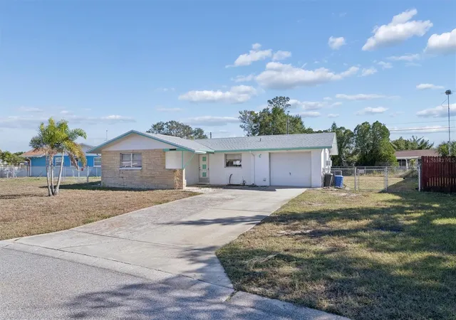Photo 3 of Sale Pending at 7608 Redcoat Ave, Port Richey, FL 34668 | MLS# O6415117 | Listing updated on 2026-08-19
