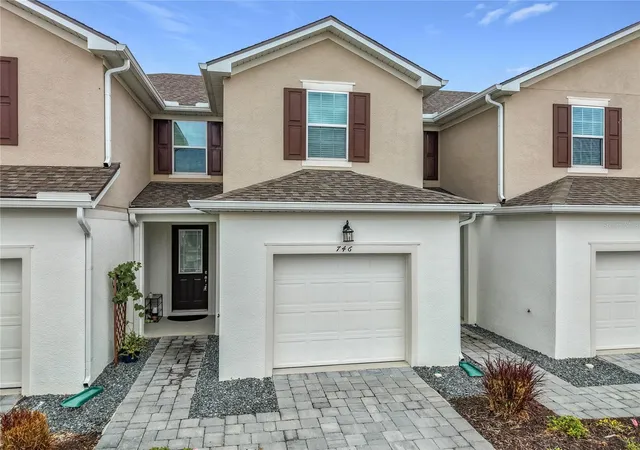 Photo 1 of Townhouse for sale at 746 Spring Palms Loop, Orlando, FL 32828 | MLS# O6415303 | Listing updated on 2026-06-20