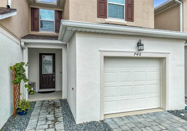 Photo 2 of Townhouse for sale at 746 Spring Palms Loop, Orlando, FL 32828 | MLS# O6415303 | Listing updated on 2026-06-20