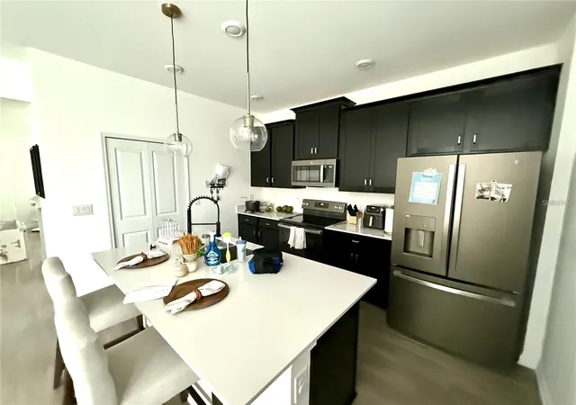 Photo 3 of Townhouse for sale at 1796 Tohoqua Blvd, Kissimmee, FL 34744 | MLS# O6415328 | Listing updated on 2026-08-15