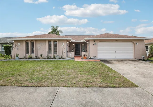 1st image of 12630 Cedar Ridge Dr, Hudson, FL 34669 | MLS# TB8517411