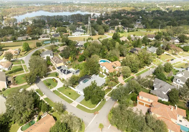 Photo 3 of Single family home for sale at 5646 Masters Blvd, Orlando, FL 32819 | MLS# O6415354 | Listing updated on 2026-08-20
